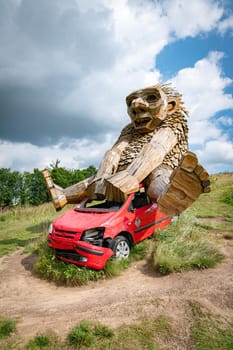 Morke, Denmark - 25-08-2024: Sigurd, the troll the bird and the red thing statue from Thomas Dambo in Morke, Denmark Stock
