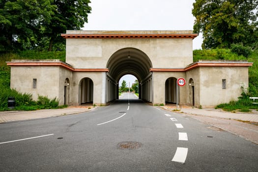 archway entrance to the city of fredericia in denmark