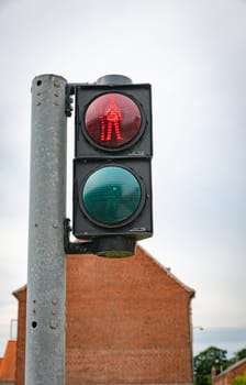 Local pedestrian traffic light with ancient soldier in Fredericia, Denmark