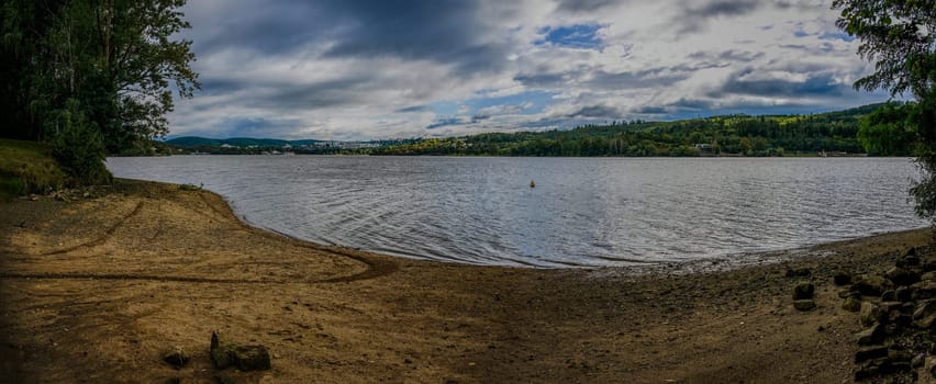 HDR panorama of landscape with water. Brno Dam - Czech Republic - city of Brno. Beautiful shot of nature. Concept for environment and ecology.