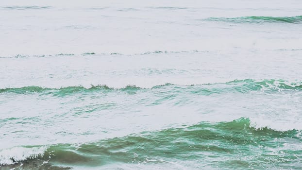 Real photo sea water waves, abstract background, nature power, pale light contrast green matte more tone in stock.
