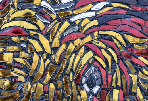 The walls are decorated with colorful Stained glass scraps mosaic. Scraps glass texture background, Creativity, art and design, Space for text, Selective focus.