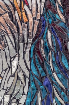 The walls are decorated with colorful Stained glass scraps mosaic. Scraps glass texture background, Creativity, art and design, Space for text, Selective focus.