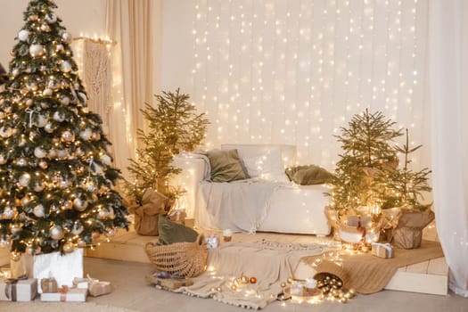 Interior bedrooms in Scandinavian style, decorated for the Christmas holidays. Live ate in the interior