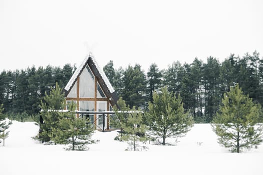A country house in nature in winter. Rest in an ecologically clean place in winter. Glamping in nature