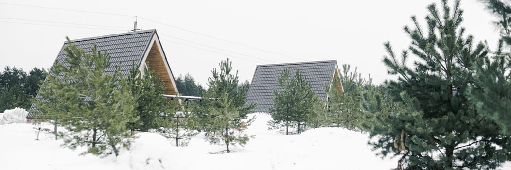 A country house in nature in winter. Rest in an ecologically clean place in winter. Glamping in nature