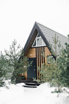 A country house in nature in winter. Rest in an ecologically clean place in winter. Glamping in nature