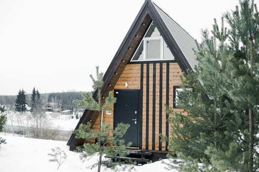 A country house in nature in winter. Rest in an ecologically clean place in winter. Glamping in nature