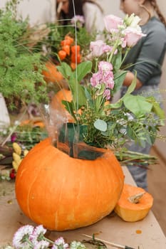 Creating a floral composition in a pumpkin. Making decor with your own hands