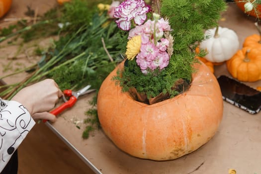 Creating a floral composition in a pumpkin. Making decor with your own hands