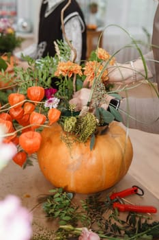 Creating a floral composition in a pumpkin. Making decor with your own hands