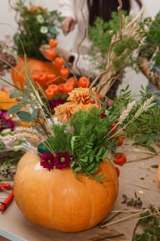 Creating a floral composition in a pumpkin. Making decor with your own hands