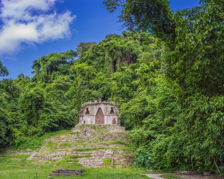 The ancient pyramids of Palenque in Mexico, surrounded by lush jungle. Iconic archaeological site showcasing Mayan culture and history. Travel, history, and adventure concept.