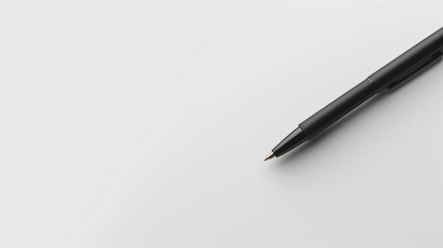 A sleek black ink pen is positioned diagonally across a pristine white background, inviting thoughts and ideas to flow freely. Its pointed tip suggests readiness for writing or drawing, emphasizing the simplicity and elegance of this writing tool.