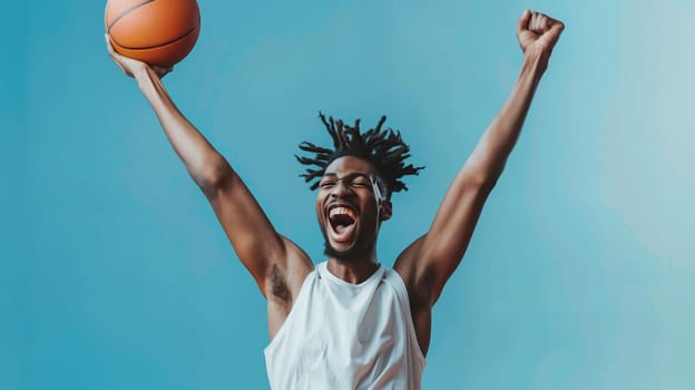 A basketball player jumps into the air with excitement, raising one arm triumphantly while holding a basketball in the other. The bright blue sky serves as a vibrant backdrop, emphasizing the athlete's joy and energy after a successful play.