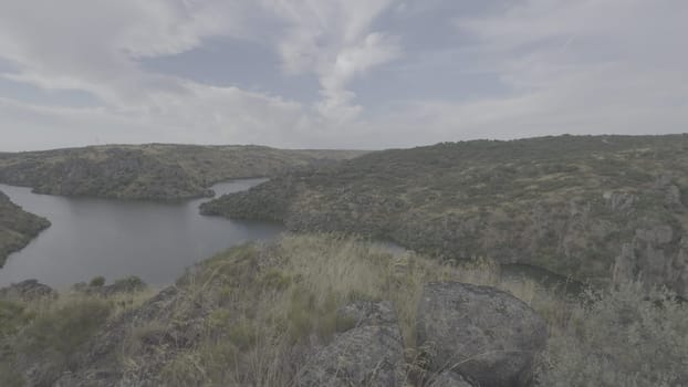 A panoramic view of the Duero River canyon and its Esla tributary in summer, with the camera panning left to right.