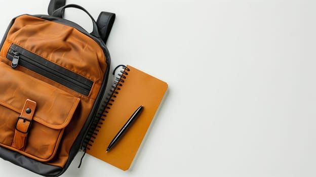A fashionable brown backpack is placed on a clean white surface, showcasing a vibrant notebook and a sleek pen that peek out from its side. This setup suggests an inviting study or work environment, perfect for creativity and organization.