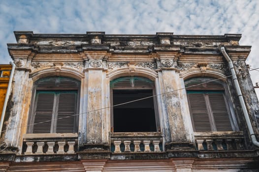 beautiful facade of an ancient Asian building in the old town of Hoi An in Vietnam