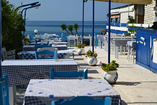 Classic Greek tavern. Corfu Island - Greece. Concept for summer holidays and vacation. 