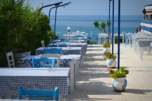 Classic Greek tavern. Corfu Island - Greece. Concept for summer holidays and vacation. 