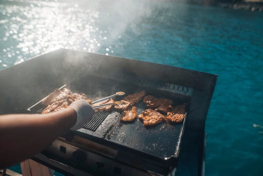 Experience the joy of outdoor cooking with beautifully vibrant grilled chicken set against a stunning water background