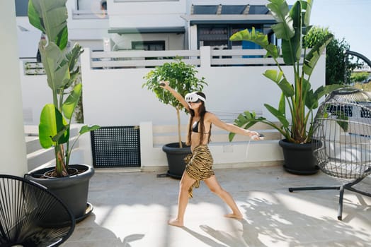 A woman dressed in a stylish and trendy outfit poses playfully within a vibrant, sunny outdoor setting filled with life