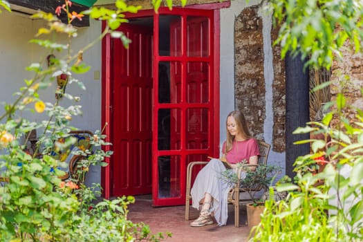 Female tourist in a colonial house in San Cristobal de las Casas, Mexico. Cultural exploration, architecture, and travel experience concept.