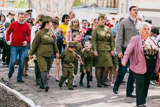VICHUGA, RUSSIA - MAY 9, 2016: The children in uniform at the parade in honor of Victory in World War II. Immortal Regiment, Russia, may 9