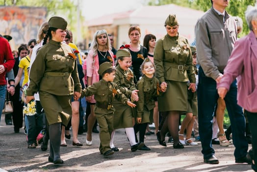 VICHUGA, RUSSIA - MAY 9, 2016: The children in uniform at the parade in honor of Victory in World War II. Immortal Regiment, Russia, may 9