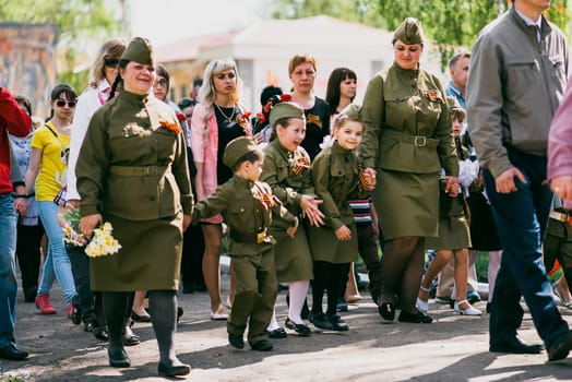 VICHUGA, RUSSIA - MAY 9, 2016: The children in uniform at the parade in honor of Victory in World War II. Immortal Regiment, Russia, may 9