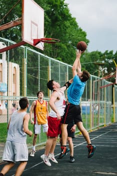 VICHUGA, RUSSIA - JUNE 11, 2016: Teenagers playing streetball on the celebration of the city of Vichuga, Russia