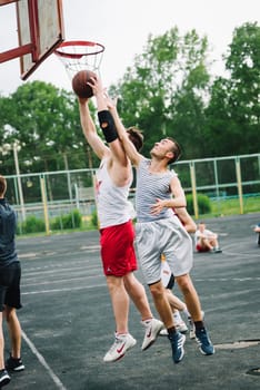 VICHUGA, RUSSIA - JUNE 11, 2016: Teenagers playing streetball on the celebration of the city of Vichuga, Russia