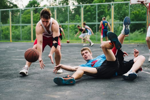 VICHUGA, RUSSIA - JUNE 11, 2016: Teenagers playing streetball on the celebration of the city of Vichuga, Russia