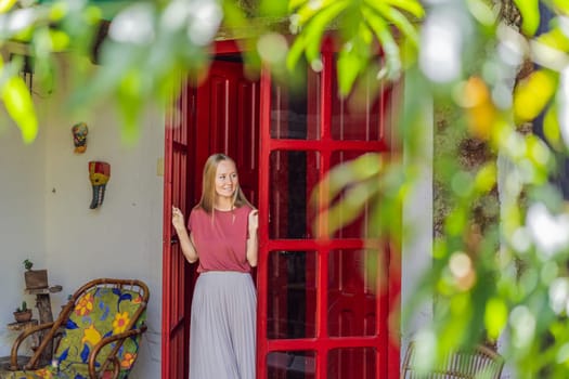 Female tourist in a colonial house in San Cristobal de las Casas, Mexico. Cultural exploration, architecture, and travel experience concept.