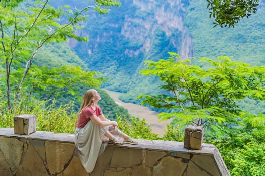 Female tourist exploring Sumidero Canyon National Park, Mexico. Adventure, natural exploration, and travel experience concept.