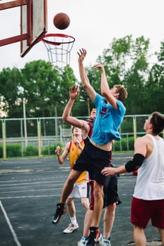 VICHUGA, RUSSIA - JUNE 11, 2016: Teenagers playing streetball on the celebration of the city of Vichuga, Russia