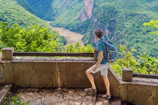 Male tourist exploring Sumidero Canyon National Park, Mexico. Adventure, natural exploration, and travel experience concept.