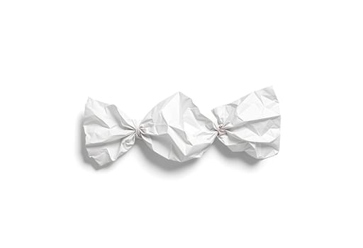 Blank white hand candy paper wrapped mock up, top view. High quality photo.