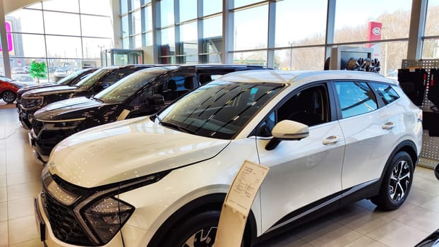 Kazan, Russia - April 04, 2023: Cars in showroom of dealership KIA. Re-export to Russia