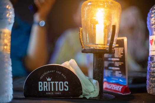Goa, India - 16th Aug 2024: Macro shot showing ice bucket of famous bar shack Brittos on Baga beach a popular spot for drinks, seafood, food, music, karaoke and more