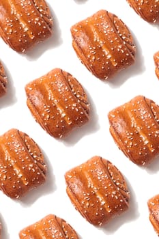 Korvapuusti, traditional finnish cinnamon and cardamom rolls, fresh baked buns in Finland and Sweden, pattern, background