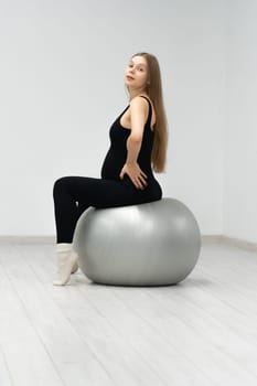 workout woman pregnancy ball fit healthy female care fitness maternity pregnant exercise