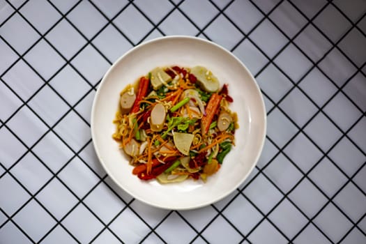 Mix seafood and sausage spicy salad , Thai style cuisine.