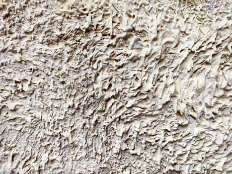 A textured background featuring intricate patterns in light neutral shades, suitable for design and text overlay.