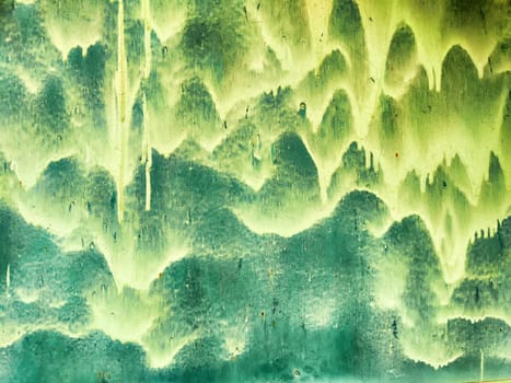 The design showcases a fluid green and aqua pattern, ideal for backgrounds, with a textured appearance and space for additional text or graphics.