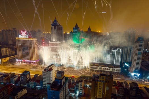 Vibrant fireworks and firecrackers illuminate the night sky in lunar new year celebrations