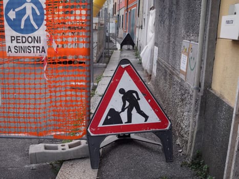 Cremona, Italy August 31st 2024 Road works sign indicating road closed for maintenance and construction, placed on a street