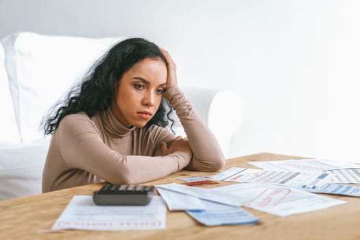 Stressed young woman has financial problems with credit card debt to pay crucial show concept of bad personal money and mortgage pay management crisis.