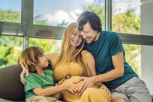 Expectant parents, mom, dad, and their eldest son share a heartwarming moment on the sofa, discussing the exciting journey of pregnancy.