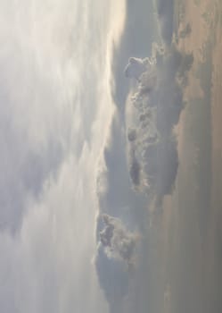 Concept idea of Imaginative clouds and sky. The softness of the clouds and the brightness of the sky. Dramatic clouds with blue sky background before sunset, Nature abstract composition, use it as your Wallpaper, Poster and Copy space, Selective focus.